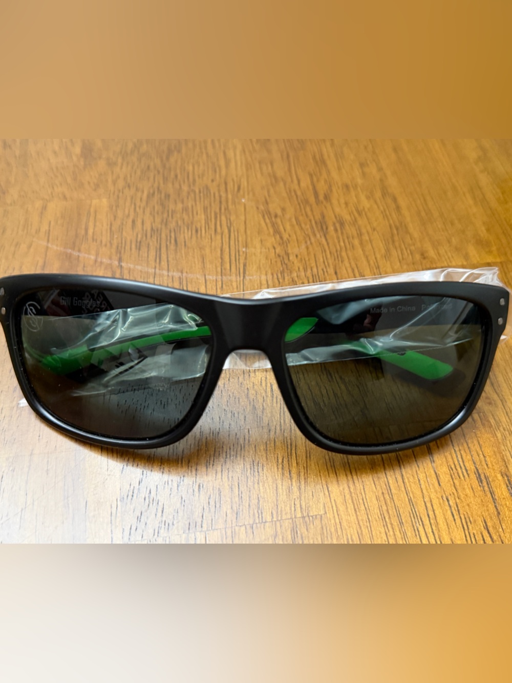 Mondoptics Black Polarized Fishing Sunglasses with Green Accents